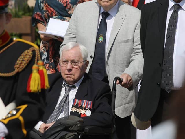 The procession along the seafront in Stokes Bay, including D-Day veteran George Carpenter