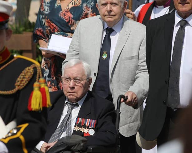 The procession along the seafront in Stokes Bay, including D-Day veteran George Carpenter