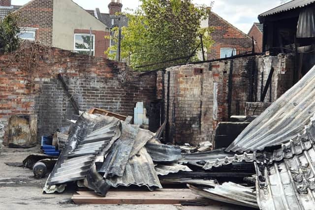 The aftermath of the blaze at Byngs Autos in Goldsmith Avenue, in Southsea in Portsmouth. The fire happened on April 28, 2021, and the photo shows the aftermath on April 29. Picture: Habibur Rahman