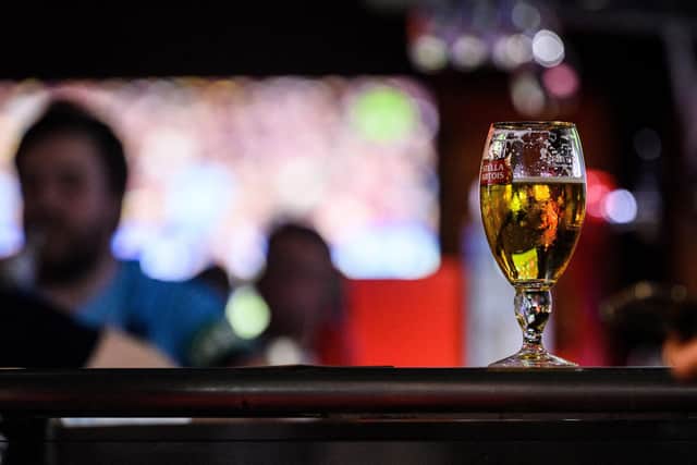 A woman was hospitalised after becoming unwell while on a night out in Brighton. Five men have been arrested for drink spiking. Picture: ANTHONY WALLACE/AFP via Getty Images).