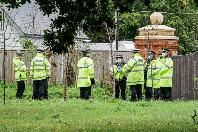Officers spent more than four hours at the scene conducting a warrant and searches. Picture: Habibur Rahman