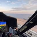 A screenshot from the video showing a pilot landing a US Coastguard helicopter on HMS Prince of Wales. Picture: UK Military & Defence Staff in US.