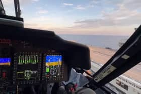 A screenshot from the video showing a pilot landing a US Coastguard helicopter on HMS Prince of Wales. Picture: UK Military & Defence Staff in US.