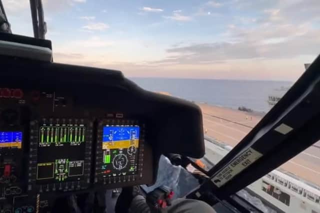 A screenshot from the video showing a pilot landing a US Coastguard helicopter on HMS Prince of Wales. Picture: UK Military & Defence Staff in US.
