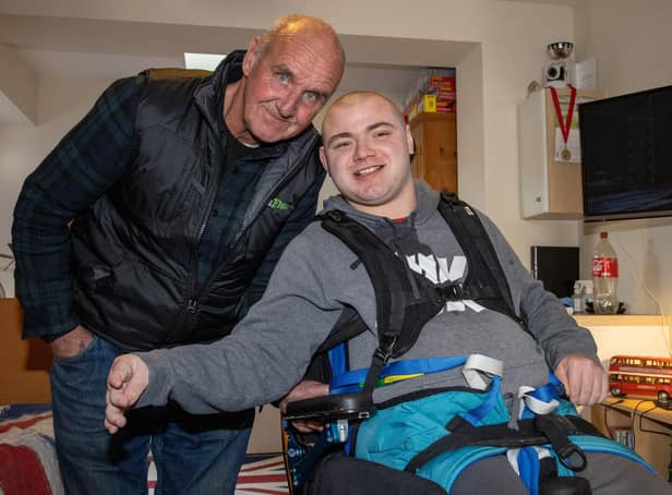 Charlie Stapleford, 20, at home with Grandad Mark Westrope after having his place at St Vincent College revoked following the council being unable to provide transport. Picture: Alex Shute