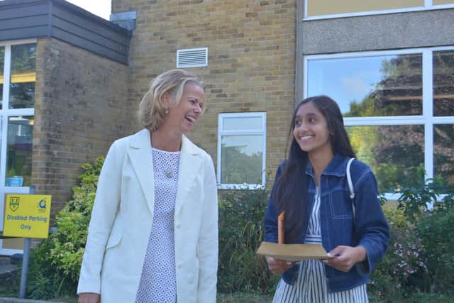 Crookhorn College headteacher, Sarah Bennett, celebrates with pupil, Visvesa Modi.
