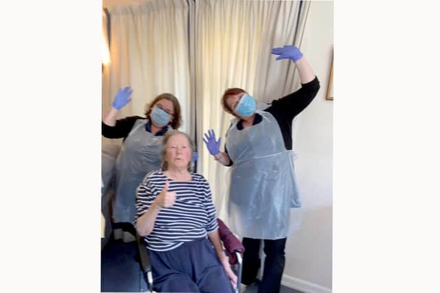 Willows carers wearing PPE with a client