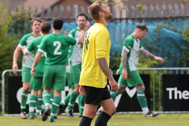 Disappointment for Burrfields as Mob Albion celebrate their winning goal. Picture: Kevin Shipp