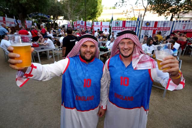 England fans Tom Egerton (left) and Tom King (right), at the Cabana Hop Garden in Doha. Picture: Nick Potts/PA Wire.