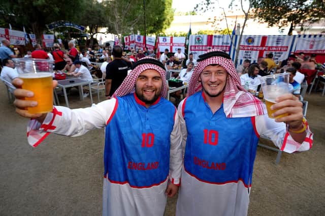 England fans Tom Egerton (left) and Tom King (right), at the Cabana Hop Garden in Doha. Picture: Nick Potts/PA Wire.