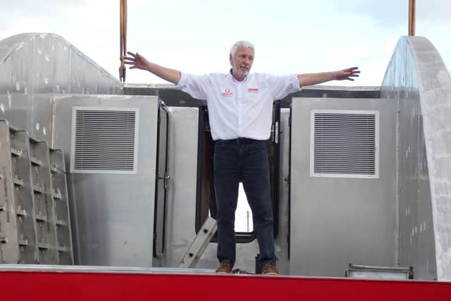 Team Britannias round the world superboat Excalibur has hit the water for the first time at a boatyard at Hayling Island. Pictured is Alan Priddy on the boat.
Picture: Team Britannia
