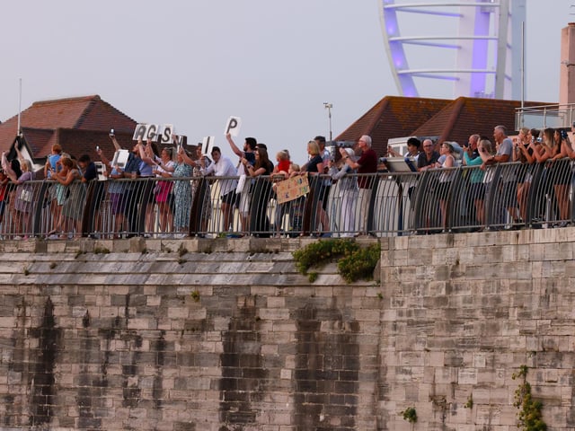 Crowds formed along The Hotwalls in Old Portsmouth to bid farewell to HMS Queen Elizabeth.