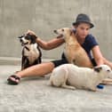 Tereza Oharkova with stray dogs in Sri Lanka