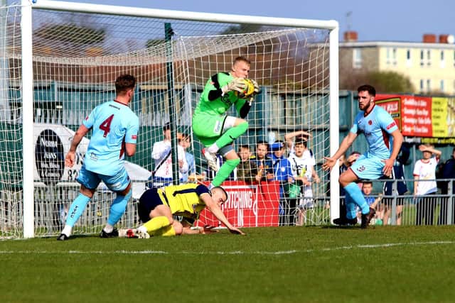 Taunton Town goalkeeper William Buse made a superb save to deny Bradley Tarbuck's second-half header Picture: Tom Phillips