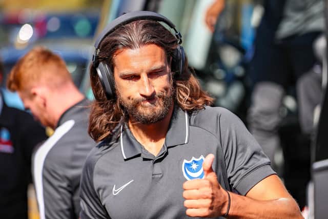 Christian Burgess will see out Pompey's play-off campaign after receiving permission. Picture: Nigel Keene/ProSportsImages/PinP