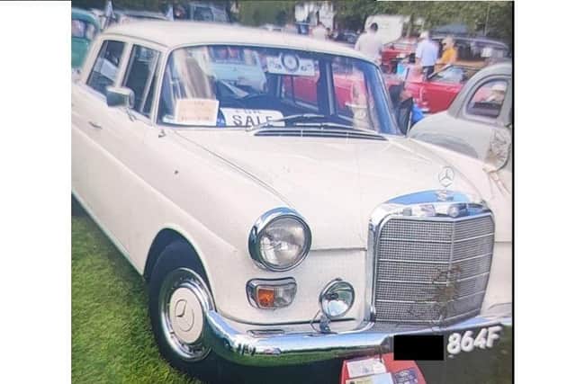 The classic white Mercedes-Benz that was stolen from a man in Stag Hill, Basingstoke. The last four digits of its registration plate are 864F.