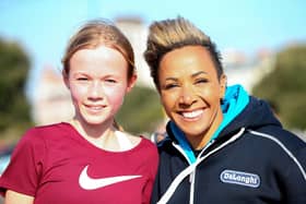 First Southsea parkrun female finisher Lauren South, left, poses for a picture with two-time Athens 2004 Olympic gold medallist Dame Kelly Holmes Picture: Chris Moorhouse (jpns 190322-18)