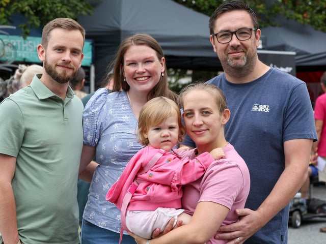 (l-r) Chris and Sarah Cotterill, and Becca and Matt Powell, with Becca holding Amelia.