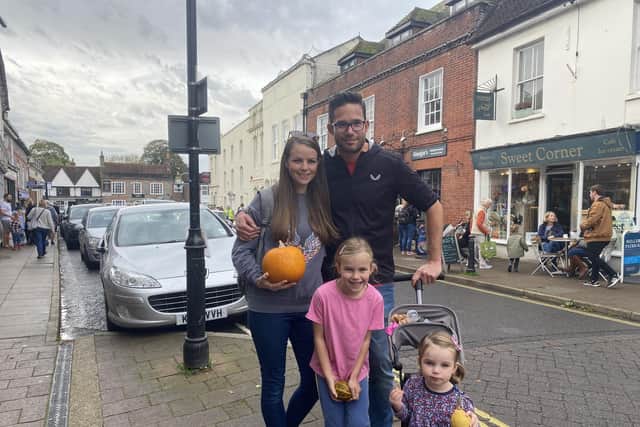 Jen and Ben Cross came to watch the tractor run with their two daughters Ruby, five, and two-year-old Amelie, in Bishops Waltham.