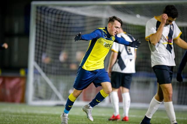 Ryan Pennery wheels away after putting Moneyfields 3-2 up against Alresford. Picture by Dave Bodymore.