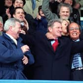 Fred Dinenage celebrates with Milan Mandaric after Pompey's First Division survival was secured in May 2001, following a 3-0 win over Barnsley. Picture: Malcolm Wells
