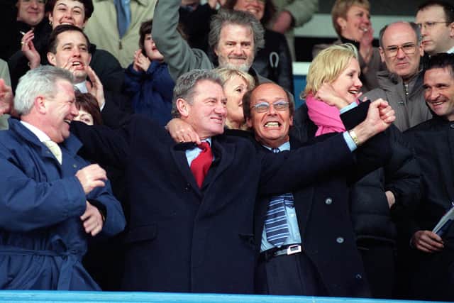 Fred Dinenage celebrates with Milan Mandaric after Pompey's First Division survival was secured in May 2001, following a 3-0 win over Barnsley. Picture: Malcolm Wells