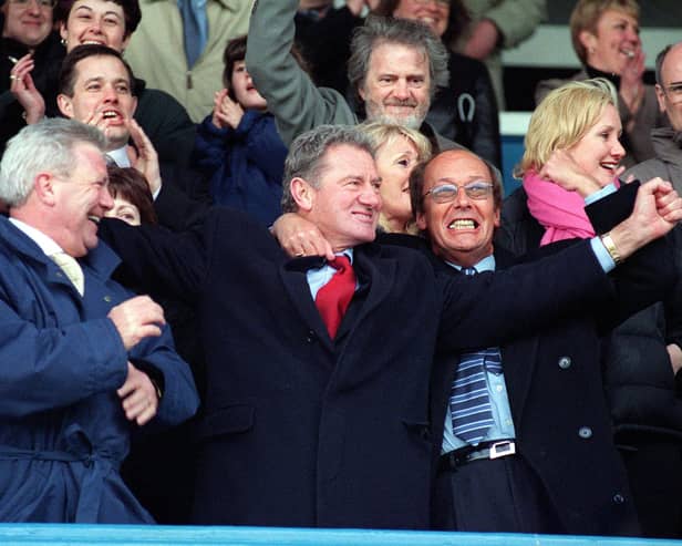Fred Dinenage celebrates with Milan Mandaric after Pompey's First Division survival was secured in May 2001, following a 3-0 win over Barnsley. Picture: Malcolm Wells