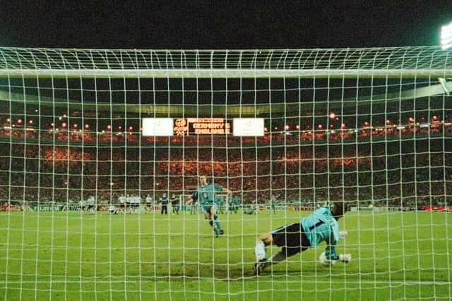 Gareth Southgate has his penalty saved by German goalkeeper Andreas Köpke during the Euro 96 shoot-out at Wembley. Photo by Ross Kinnaird/Allsport/Getty Images.