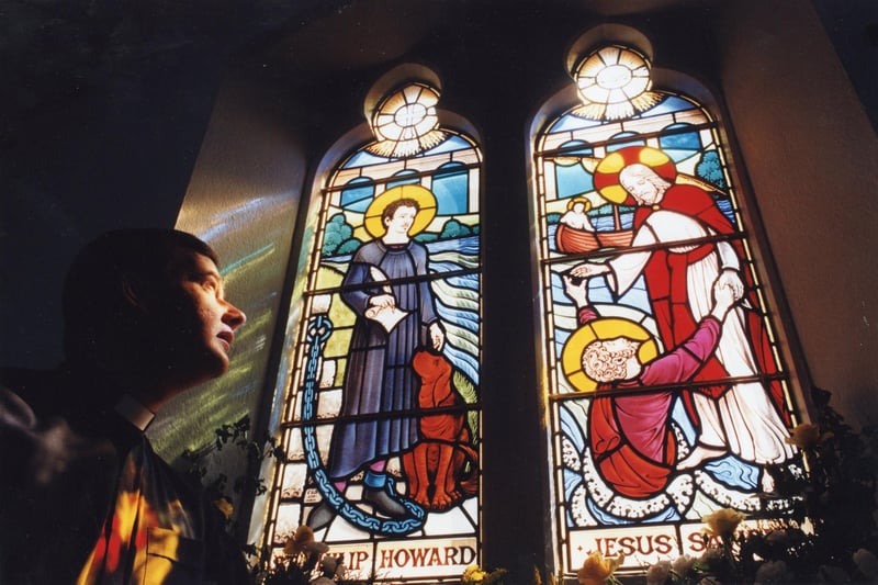 Sunlight shines through the stained glass window at The Sacred Heart Church in Bishops Field Road, Fareham May 6 1995. The News PP3154
