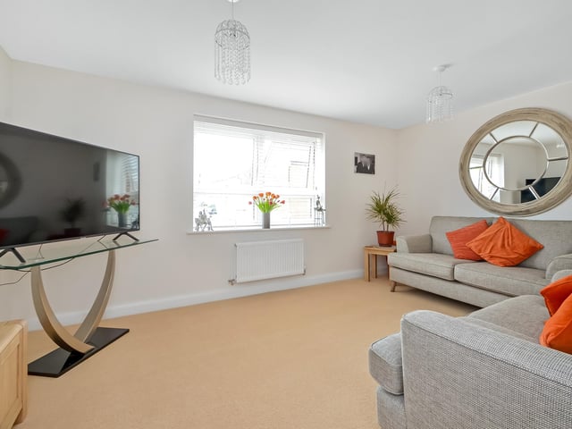 This three bedroom property is on the market at a guide price of £415,000. It is listed by Town and Country.