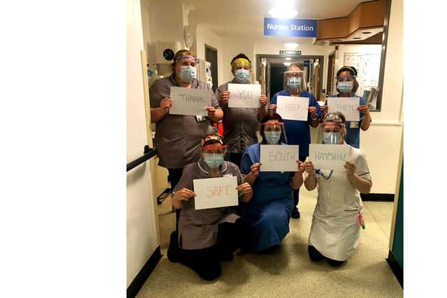 Caption: Staff at the Gosport War Memorial Hospital thank the group for a donation of visors. Picture: Paul Lawson