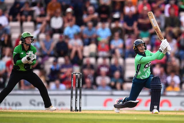 Marizanne Kapp of Oval Invincibles Women plays a shot as Carla Rudd looks on. Photo by Harry Trump/Getty Images.