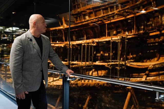 Ross Kemp looking at the Mary Rose.