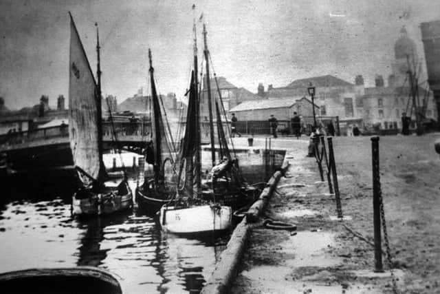 The Camber, Old Portsmouth, which shows how the Bridge Tavern got its name. It is believed the picture was taken before 1926.