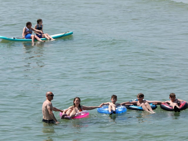 The water gave beachgoers the perfect place to cool down.