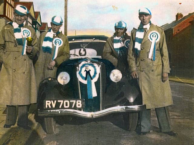 Sent in by Brian Sessions of Bedhampton, here we see a marvellous tinted photo from 1939. It was taken at 33, Madeira Road, Copnor just before the party set off for Wembley for the 1939 cup final. On the left is Stan Davis Brian's uncle. Next to him is George Sessions, Brian's father and third from the left is his grandfather George Sessions. The man far right is a neighbour.
The car was a Ford 8 or 10 no doubt the 'latest in motoring' in those days.