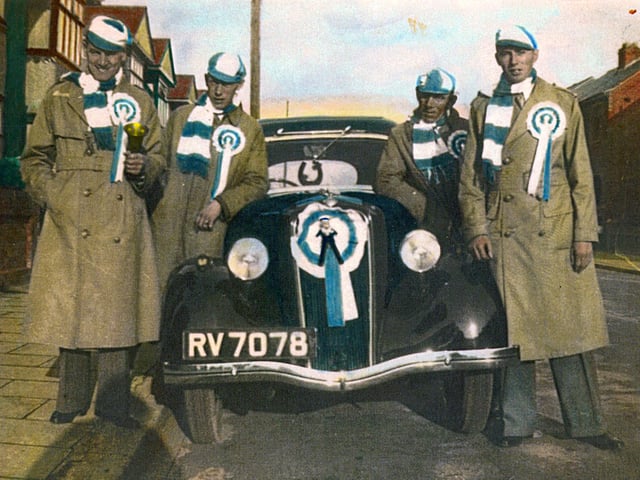 Sent in by Brian Sessions of Bedhampton, here we see a marvellous tinted photo from 1939. It was taken at 33, Madeira Road, Copnor just before the party set off for Wembley for the 1939 cup final. On the left is Stan Davis Brian's uncle. Next to him is George Sessions, Brian's father and third from the left is his grandfather George Sessions. The man far right is a neighbour.
The car was a Ford 8 or 10 no doubt the 'latest in motoring' in those days.
