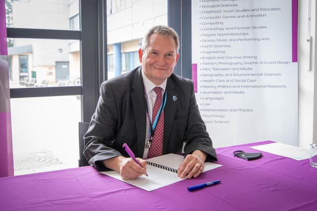 Pictured: Vice-chancellor Professor Graham Galbraith of Portsmouth University signing the official papers at Highbury College, Portsmouth.

Picture: Habibur Rahman