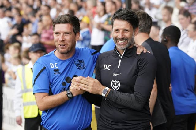 Pompey boss Danny Cowley, right, with Port Vale manager Darrell Clarke ahead of today's game at Vale Park Picture: Jason Brown
