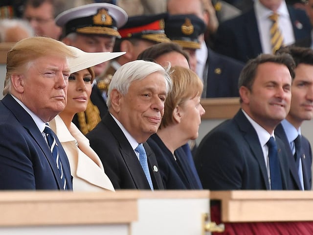 US President Donald Trump (L), US First Lady Melania Trump (2L), Greek President Prokopis Pavlopoulos (3L), German Chancellor Angela Merkel (C), Luxembourg's Prime Minister Xavier Bettel (2R) and Canadian PM Justin Trudeau