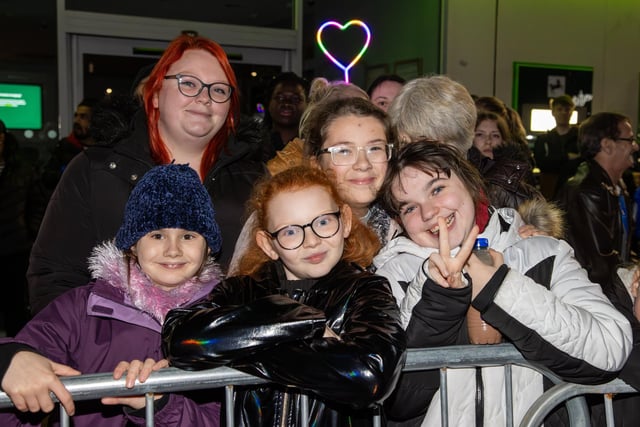 Hundreds of residents descended on Commercial Road to watch local dance troops and celebrities come together to turn on the Christmas lights.

Pictured - Taylor Family

Photos by Alex Shute