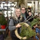 Karla Bell, left, owner of Blooms & Balloons in Copnor Road, Portsmouth, with helper Sam Howell. Picture: Sarah Standing (281124-6711)