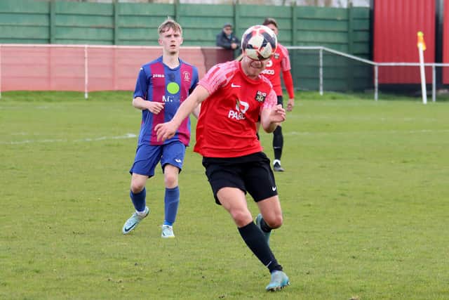 A Fareham player keeps his eye on the ball against US Portsmouth. Picture by Ken Walker
