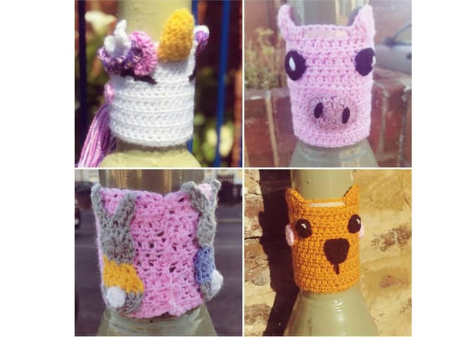 Mum and daughter duo Holly and Elsie Mitchell, four, have been putting out 'yarn bomb' creations to cheer up children heading to St John's CE Primary School in Gosport. Pictured: A selection of the yarn creatures