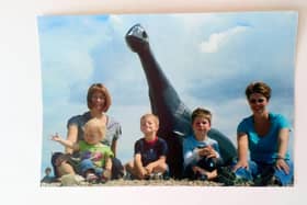 Families have shared some favourite photos of Luna Park, the Southsea dinosaur. Pictured: (left to right), Michelle Roberts with Erin Roberts, Sam Roberts, Luna Park, Jacob Bradley and Claire Bradley. Picture by Lynne Hiscock