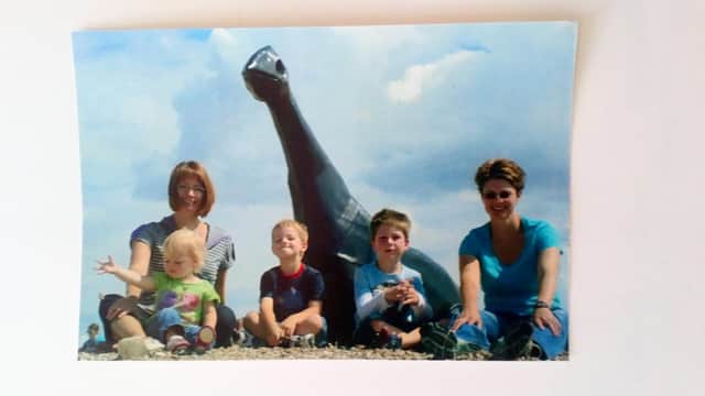 Families have shared some favourite photos of Luna Park, the Southsea dinosaur. Pictured: (left to right), Michelle Roberts with Erin Roberts, Sam Roberts, Luna Park, Jacob Bradley and Claire Bradley. Picture by Lynne Hiscock