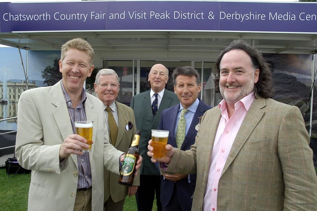 David James, chief executive of Visit Peak District & Derbyshire, left, toasts the tourist board’s closer working ties with Jim Harrison, owner of Thornbridge Brewery in Bakewell (front right). 
Back row: Visit Peak District & Derbyshire patron David Hardman, the Duke of Devonshire and Lord Sebastian Coe, president of Chatsworth Country Fair, pictured in 2013