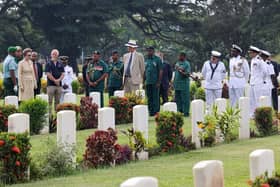 Pictured: HRH The Princess Royal visit the graves at the Commonwealth (Bomana) War Cemetery.