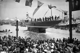April 1934:  The launch of Tommy Sopwith's all-steel yacht Endeavour, this years challenger for the America's Cup, at Gosport, Hampshire.  (Photo by A. Hudson/Topical Press Agency/Getty Images)