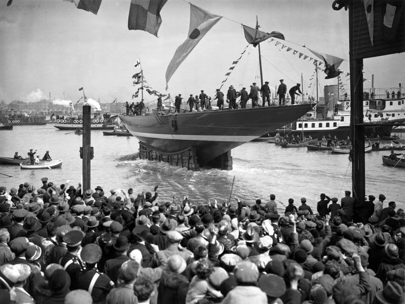 April 1934:  The launch of Tommy Sopwith's all-steel yacht Endeavour, this years challenger for the America's Cup, at Gosport, Hampshire.  (Photo by A. Hudson/Topical Press Agency/Getty Images)
